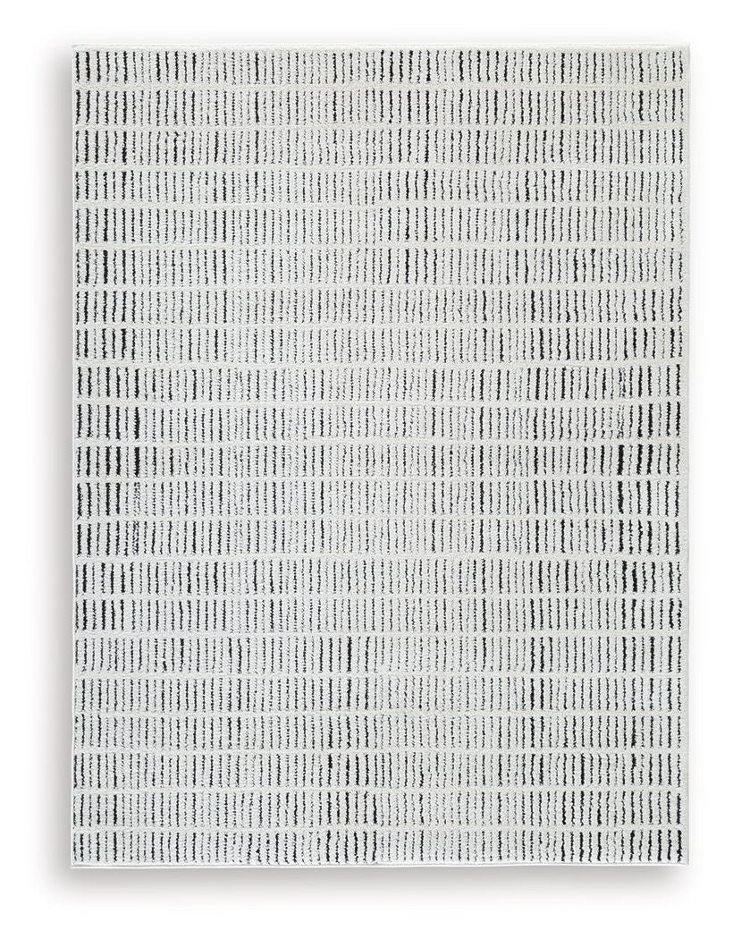 Turinwith - 5' x 7' Rug - Ivory / Black